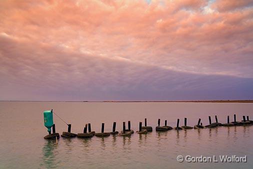 Really Weird Atmospherics_30077.jpg - Thought I was on MarsOld tire breakwater photographed at Powderhorn Lake on the Gulf coast near Port Lavaca, Texas, USA.